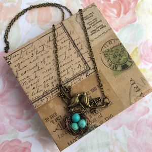 Love birds with egg nest